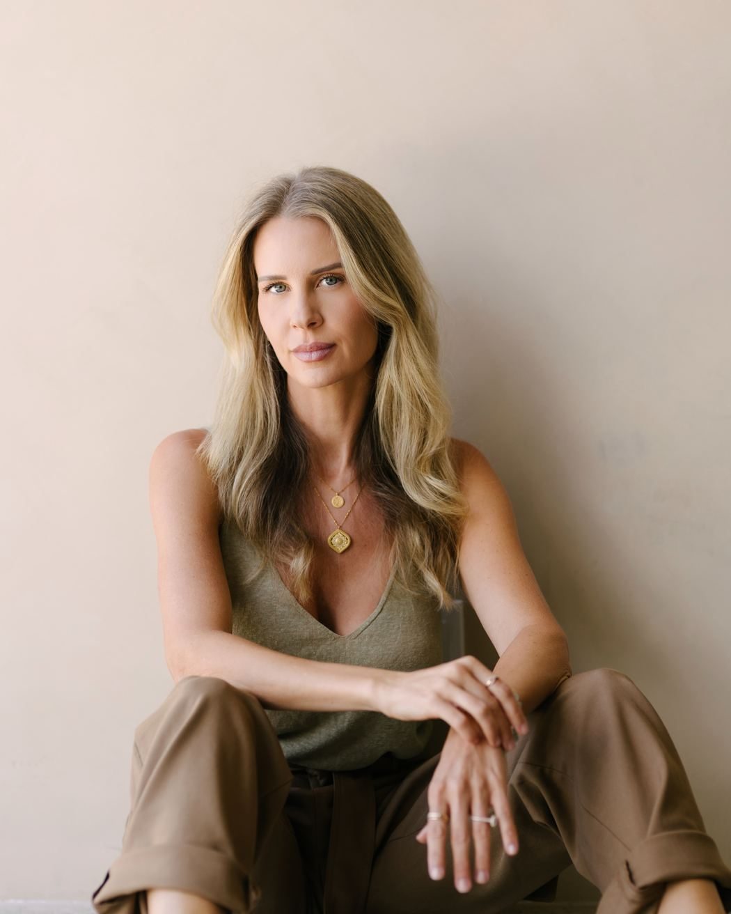 Portrait of Elle Wilk, seated and looking directly at the camera